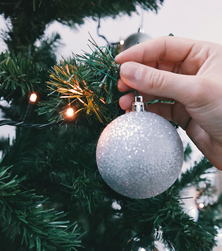 christmas, tree, ball, decor, ornament, lights, hand, christmas decoration HD wallpaper