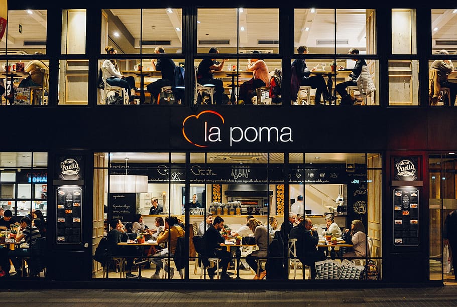 People at La Poma Store Front at Night, chairs, commerce, eating HD wallpaper