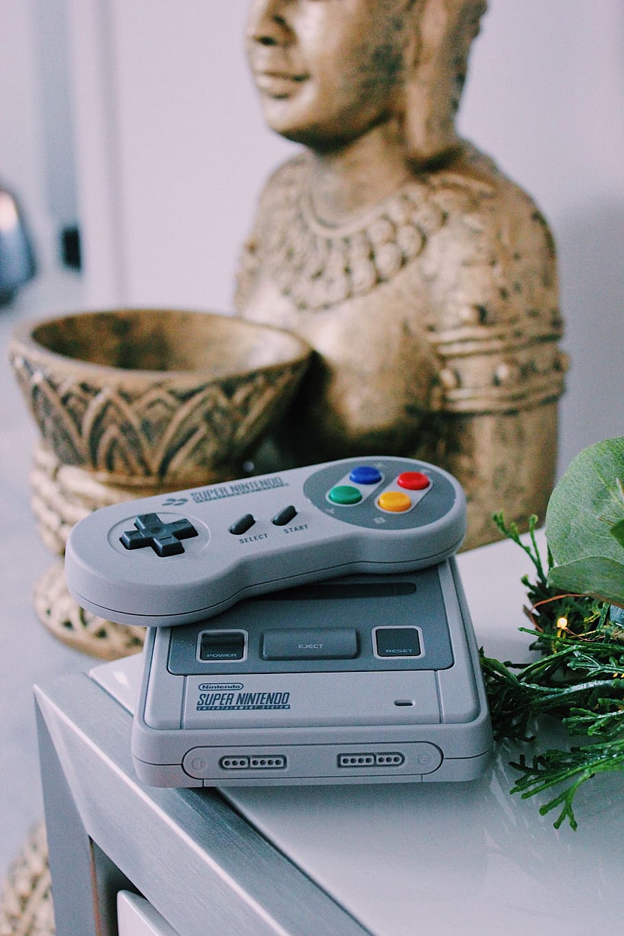 gray-super-nintendo-game-console-with-co