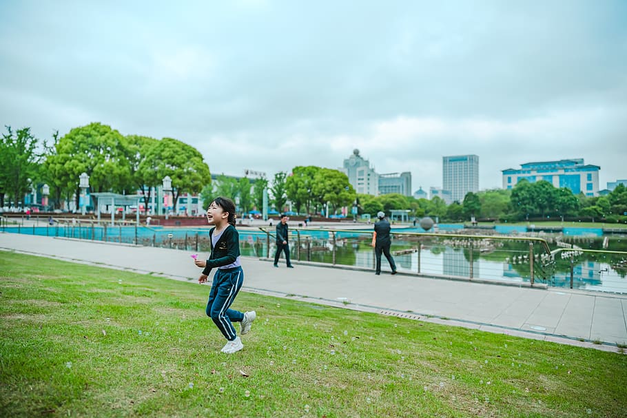 boy playing in open area, real people, sky, built structure, one person HD wallpaper