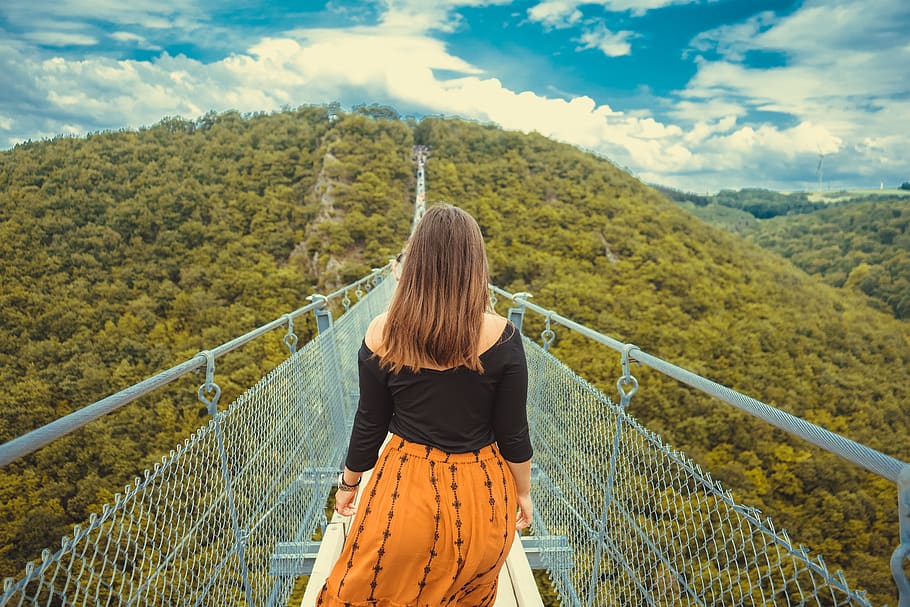 Photo of Woman Walking on a Canopy Walkway., adventure, back view HD wallpaper