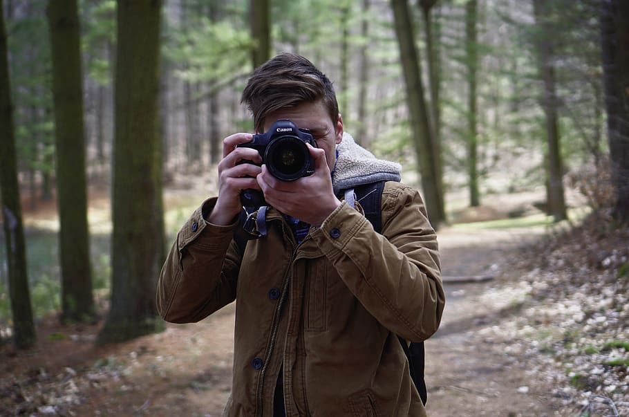 man holding brown coat, person, human, people, binoculars, taking a photo HD wallpaper