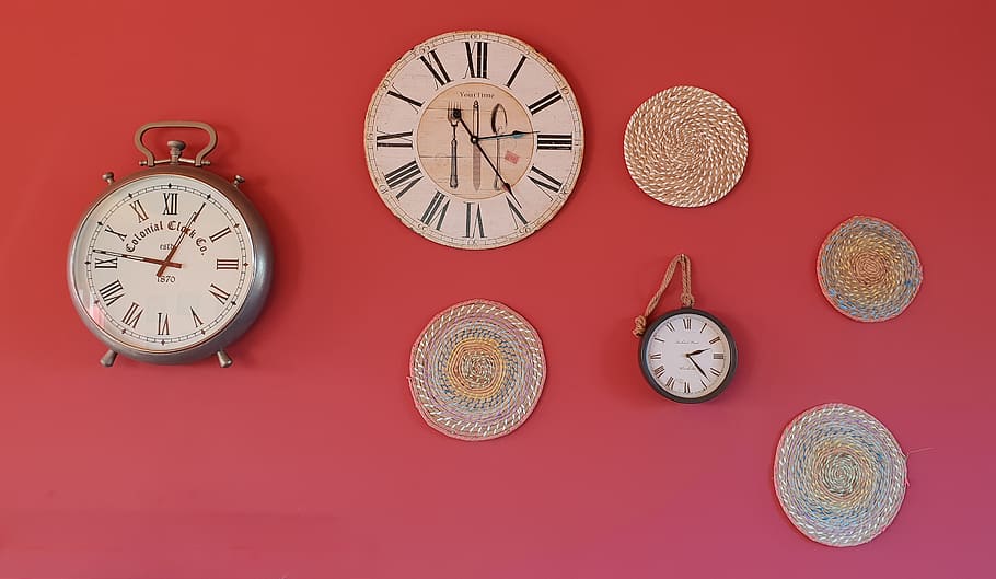 three round analog clocks and round gray mats, time, studio shot HD wallpaper