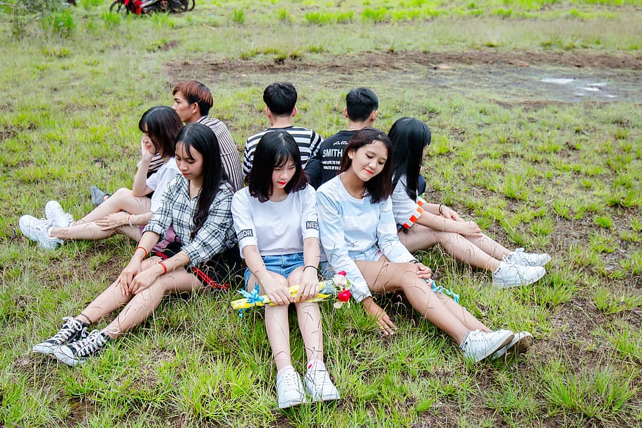 Men and Women Sitting on Grass Forming Circle of Friends, outdoors HD wallpaper