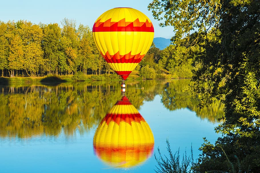 balloon, hot air, reflection, trees, rising, sky, colorful HD wallpaper