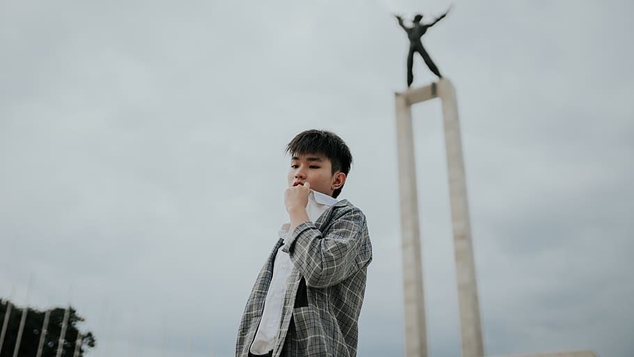 man standing near tower, model, street, mood, person, photoshoot HD wallpaper