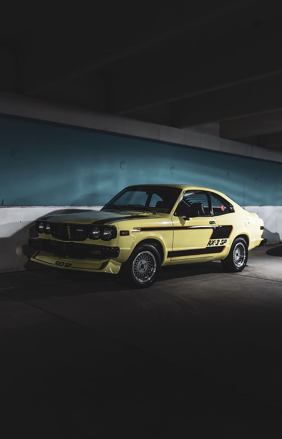 Classic Yellow Coupe Parked Next to Wall, car, pavement, transportation system HD wallpaper