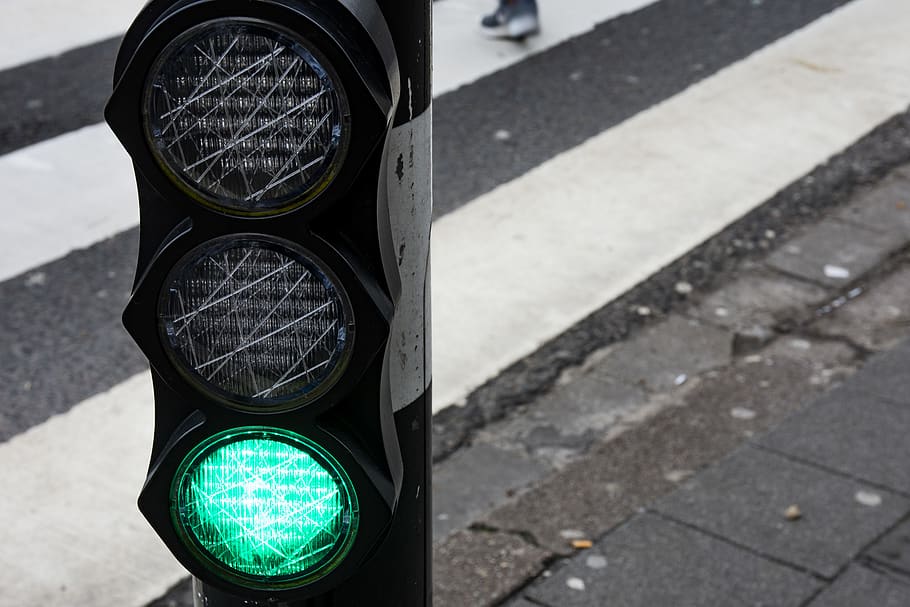 black traffic light, asphalt, tarmac, human, person, wheel, machine HD wallpaper