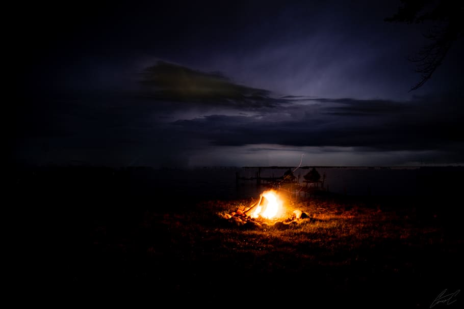 bonfire during nighttime, flame, storm, camping, lightning, nature, HD wallpaper