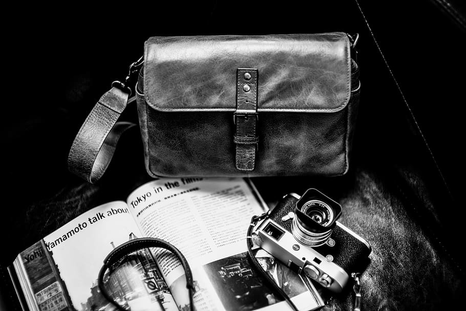 milc camera beside bag on grayscale photography, still life, high angle view, HD wallpaper