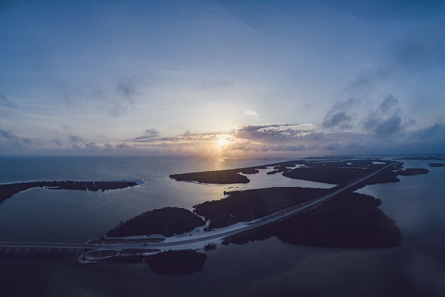 Aerial Photography of Island during Sunset, bridge, clouds, dusk HD wallpaper