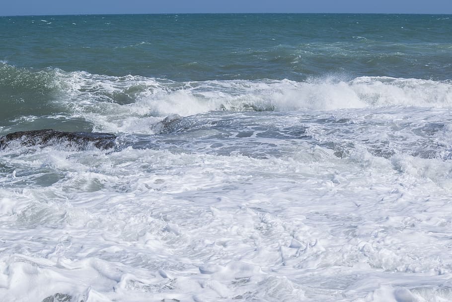 sea, rock, waves, foam, sky, nature, water, motion, aquatic sport HD wallpaper