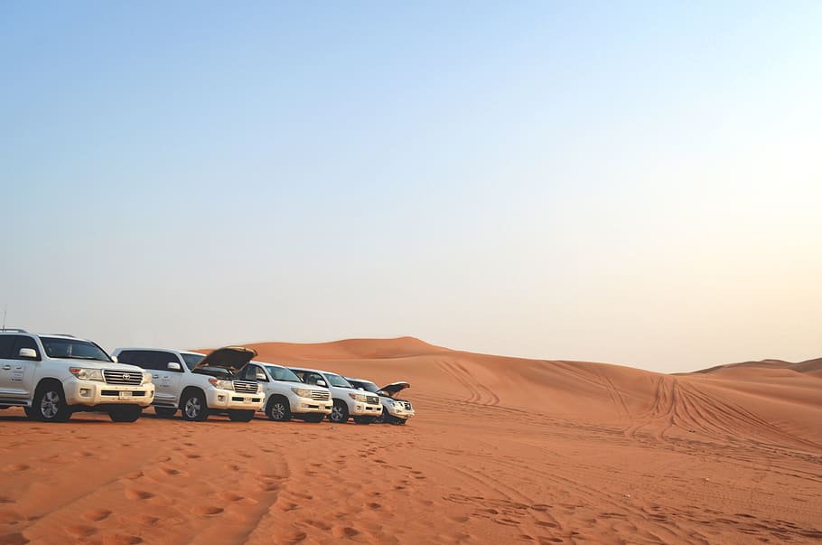 five white vehicles parked on desert, soil, outdoors, machine, HD wallpaper
