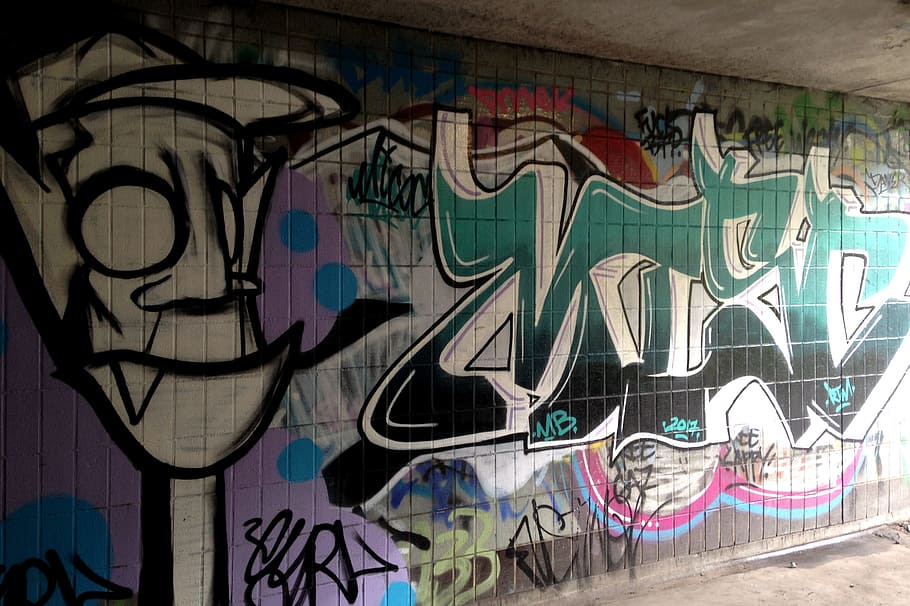 Graffiti on the underpass beneath Manchester's inner ring road, the Mancunian Way.