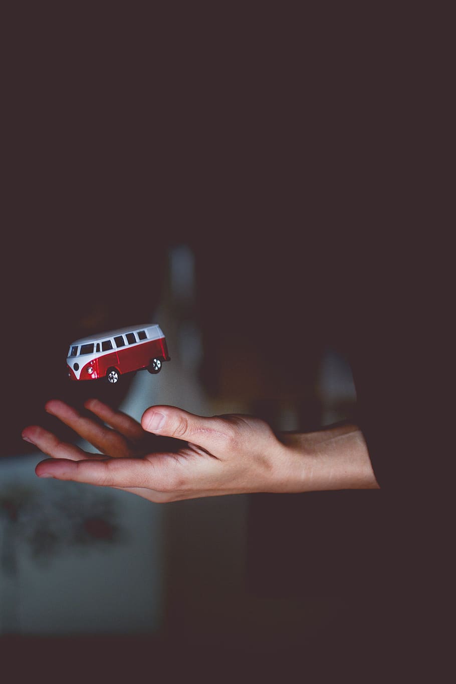 Red and White Bus Toy, action, blur, color, conceptual, hand HD wallpaper