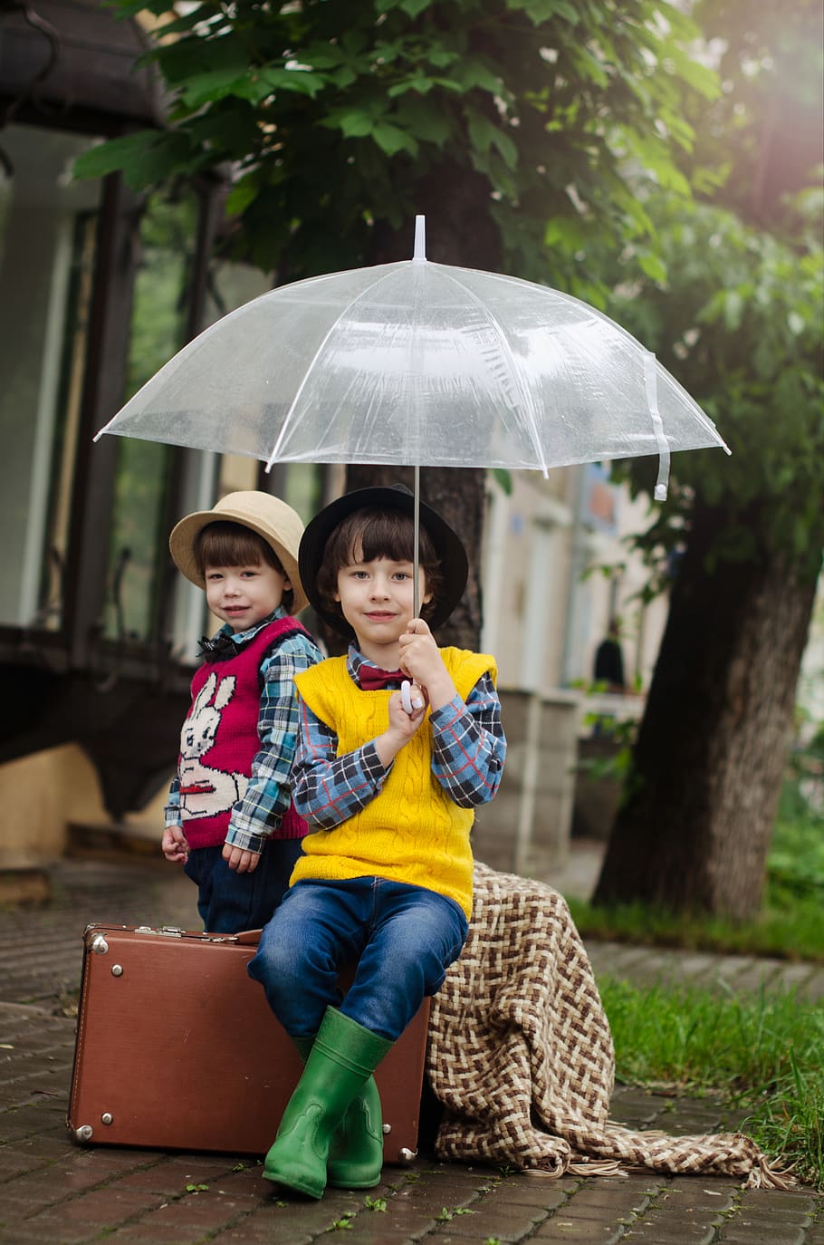 Girl Holding Umbrella While Sitting on Brown Suitcase, adorable, HD wallpaper