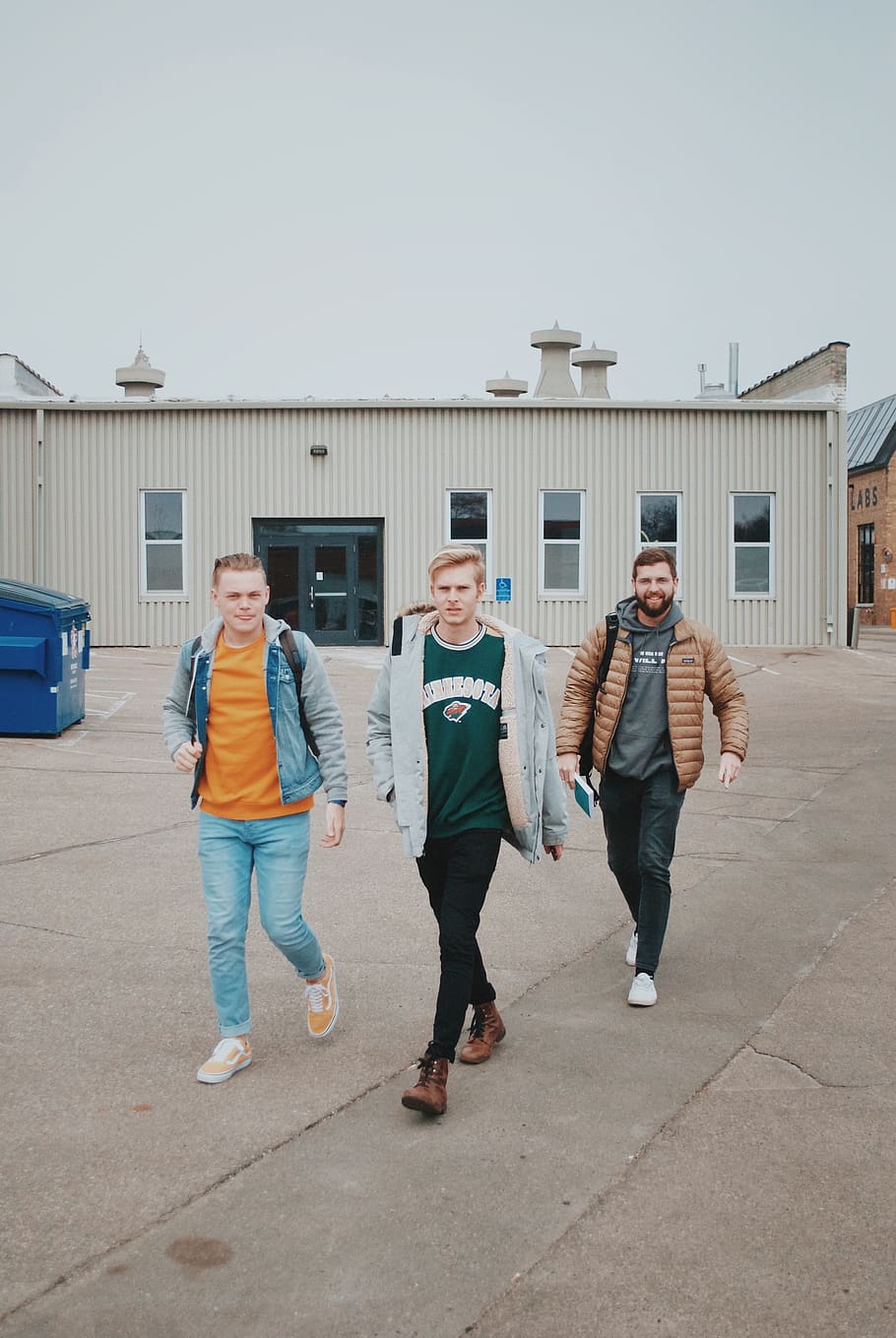 three walking men wearing jackets, full length, real people, sky HD wallpaper