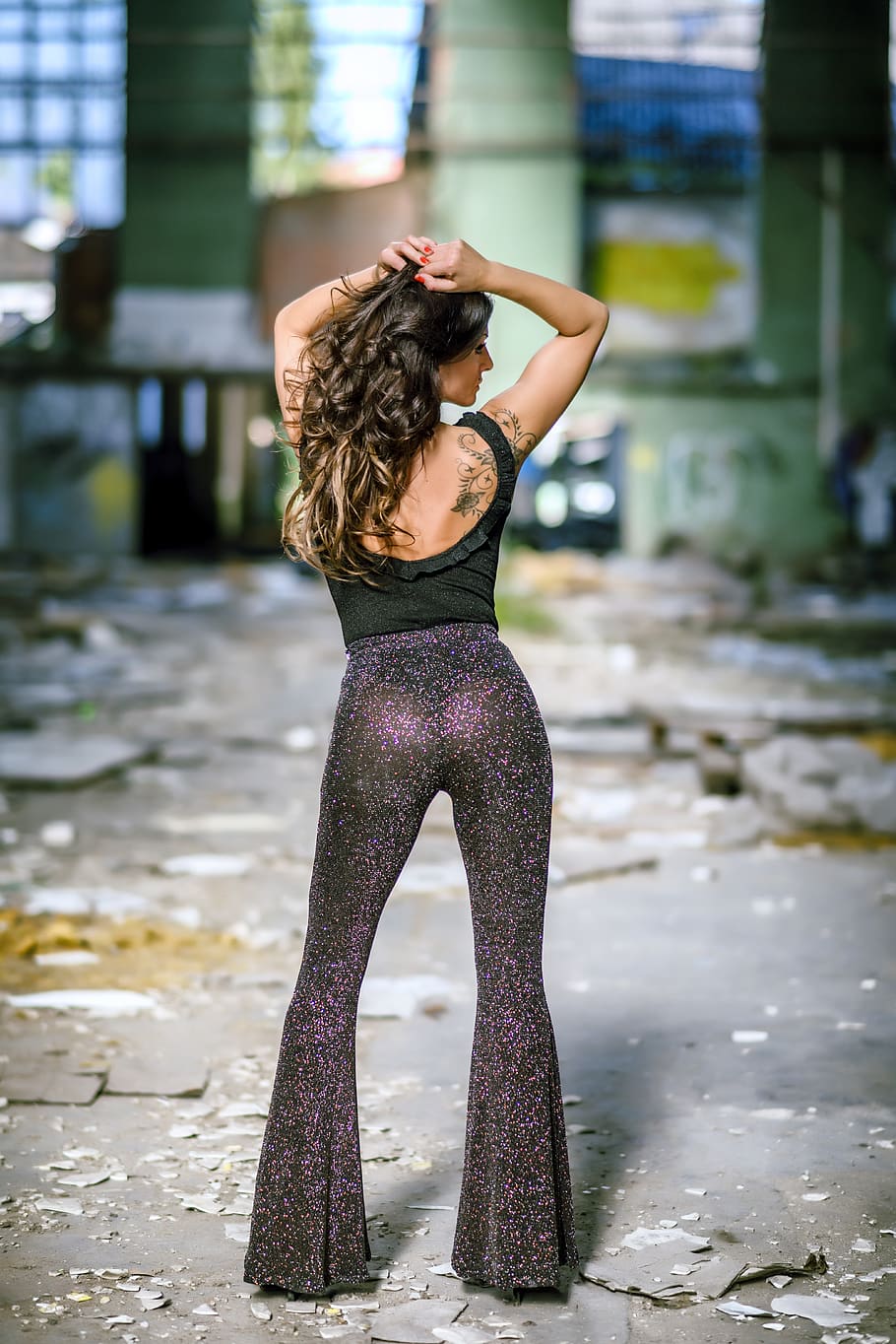 Download Showcasing Edgy Glamour: Elegant Black Women in Back-to-back Pose  Wallpaper | Wallpapers.com