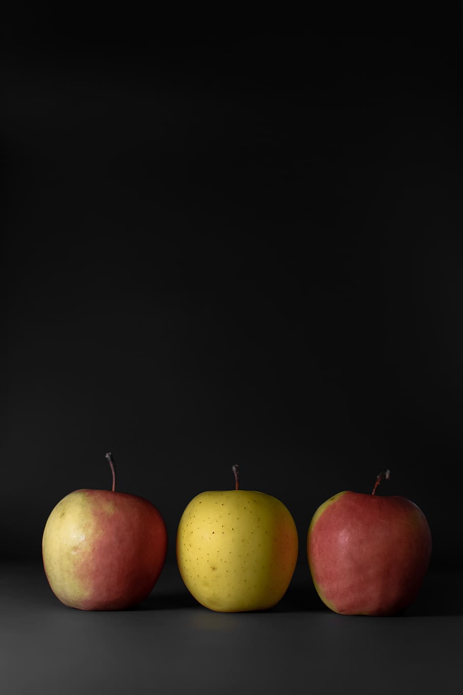 three apples behind black background, fruit, apple - fruit, healthy eating HD wallpaper