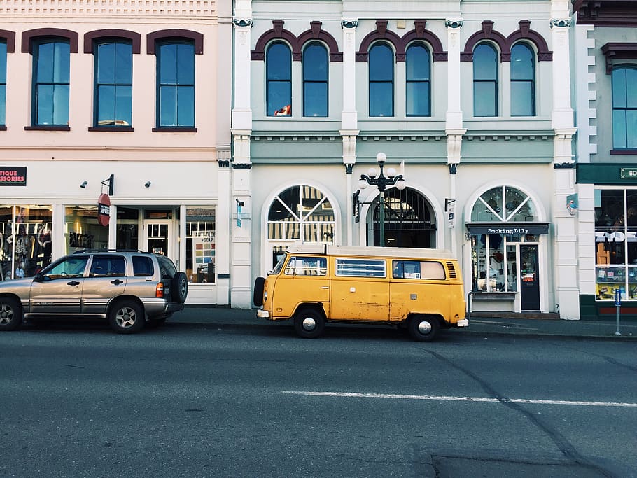 yellow van behind silver SUV, building exterior, transportation HD wallpaper