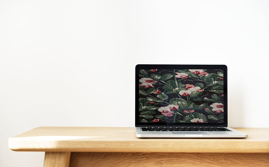 Macbook Pro on Top of Brown Desk, design, device, electronics HD wallpaper