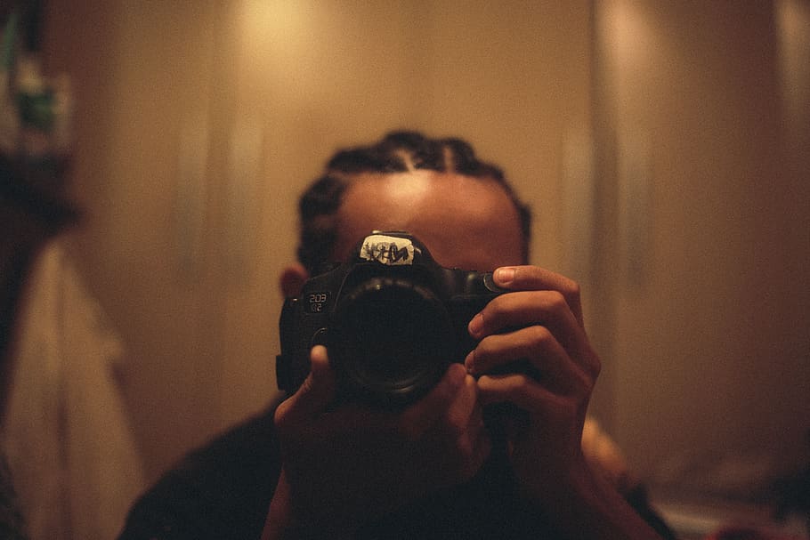 Person Holding Dslr Camera, blur, braids, close-up, depth of field HD wallpaper