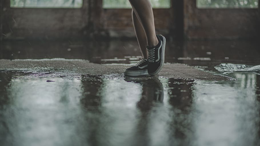 person with black Vans sneakers walking on wet pavement, human leg, HD wallpaper