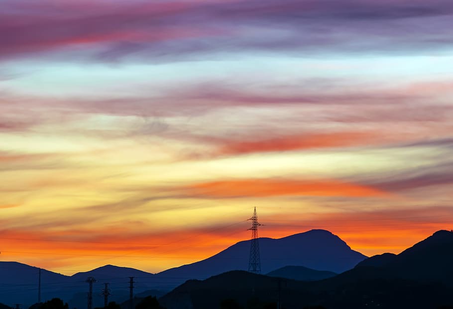 sunset, tower electric, sky, clouds, atmosphere, mountain, cloud - sky HD wallpaper