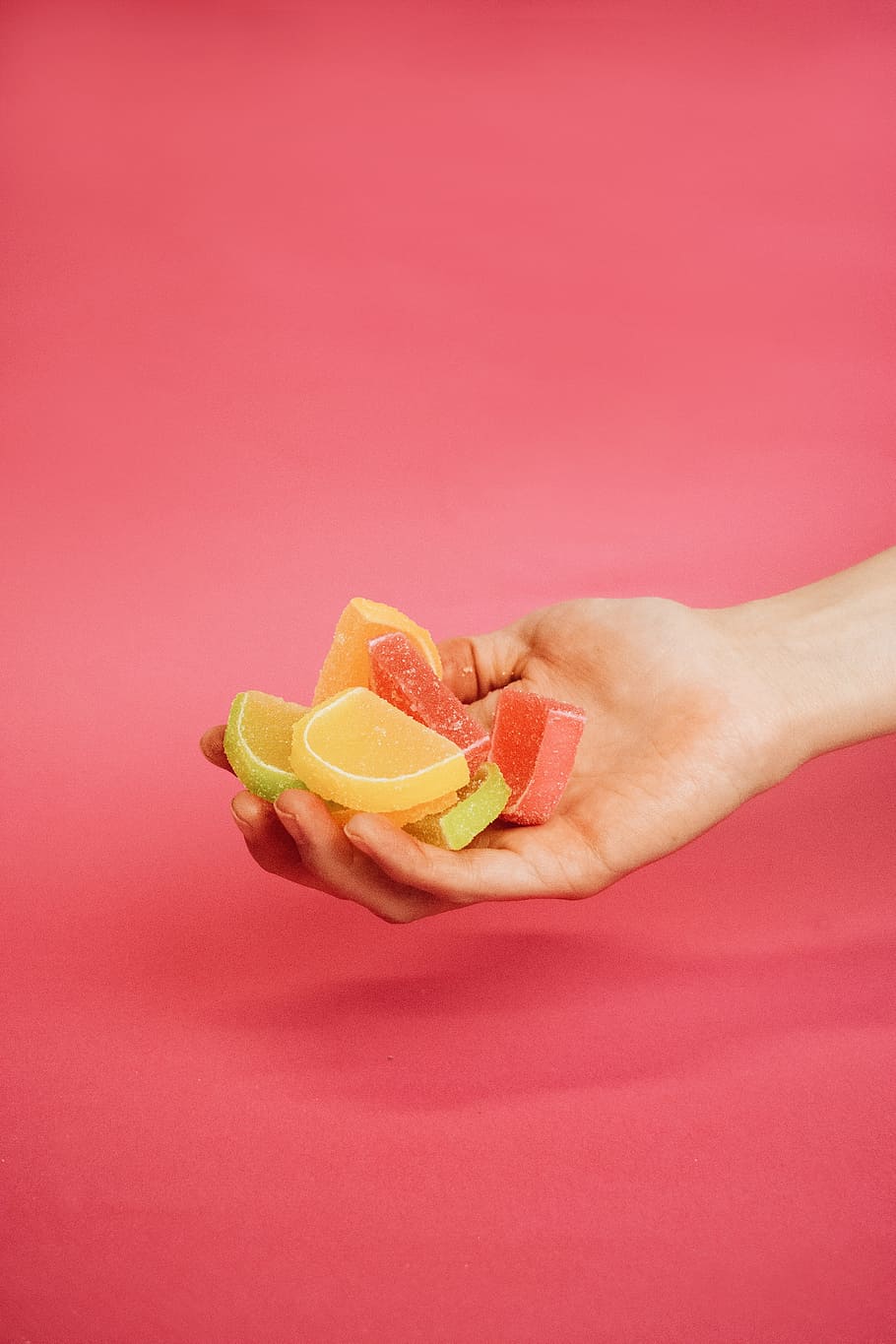 assorted dried fruits, sweets, candy, hand, sugar, treat, minimal HD wallpaper