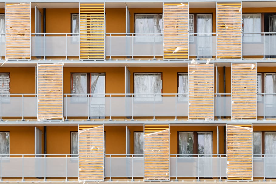 orange and brown concrete building, architecture, apartment, balcony HD wallpaper