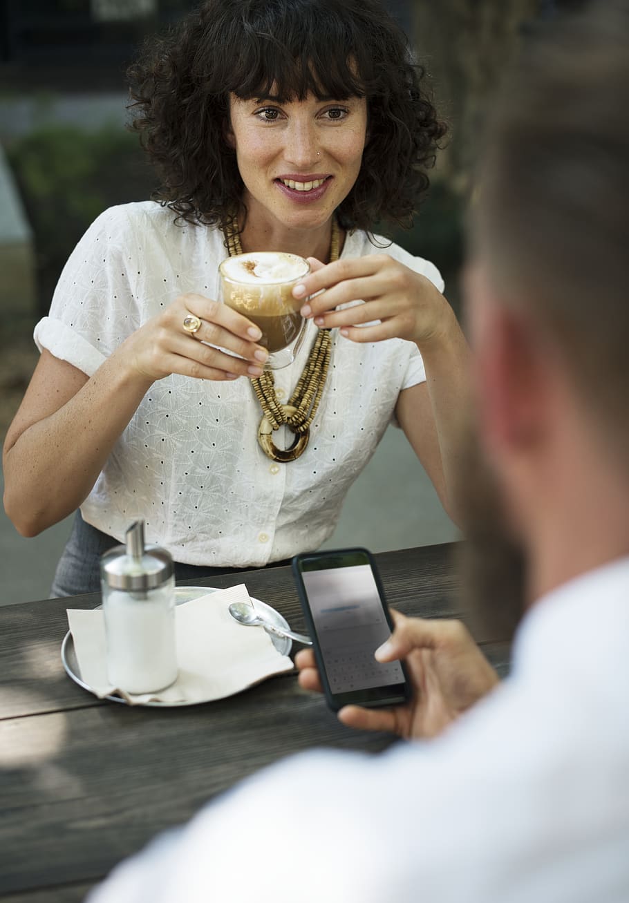 Woman Holding Teacup Full of Latte, beverage, coffee, drink, girl