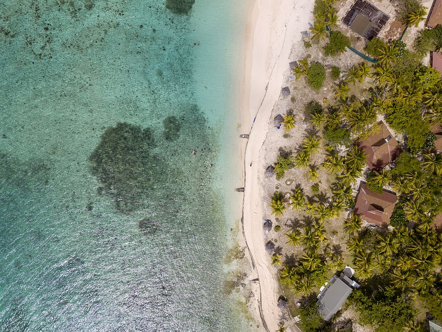 Aerial View Of Beach And Huts, aerial shot, bird's eye view, drone shot