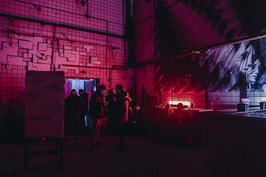 people inside building with red light, night, group of people HD wallpaper