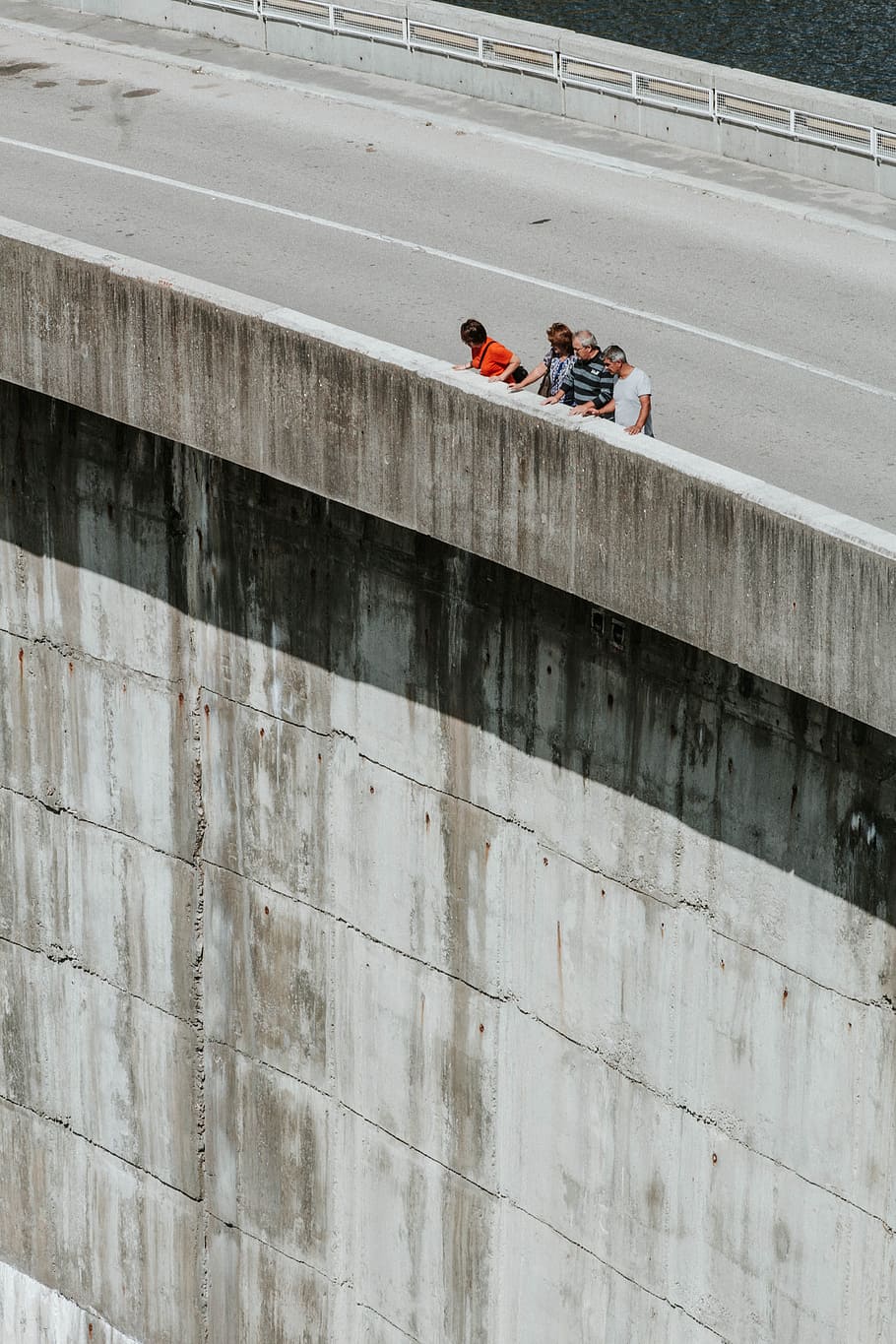 Four Persons Standing Beside Concrete Wall, bridge, construction HD wallpaper