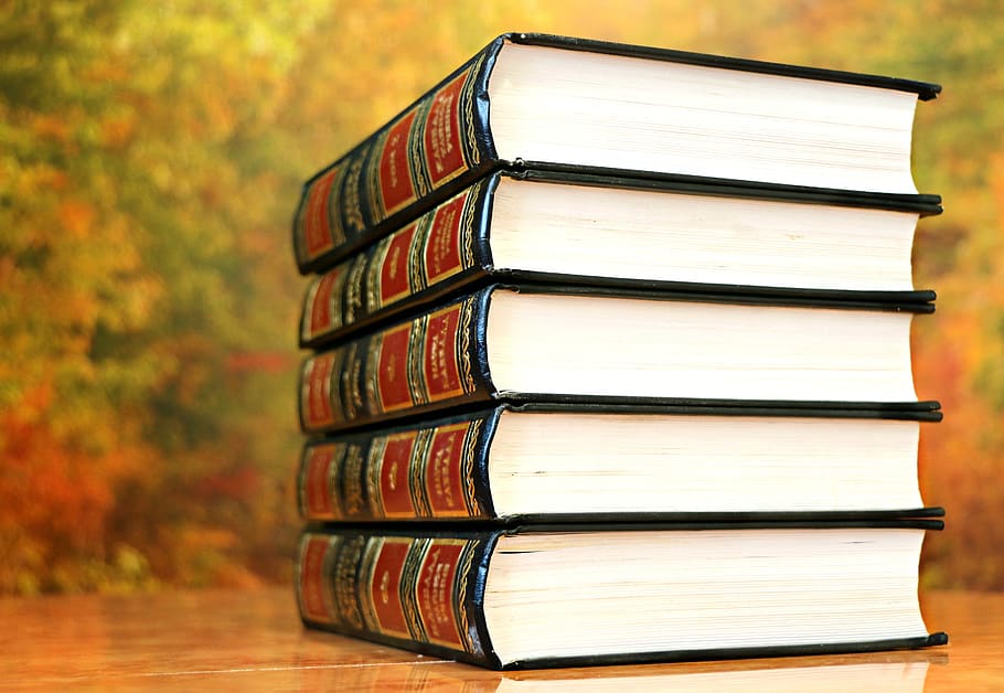 Five Hardbound Books on Brown Surface, book stack, collection HD wallpaper