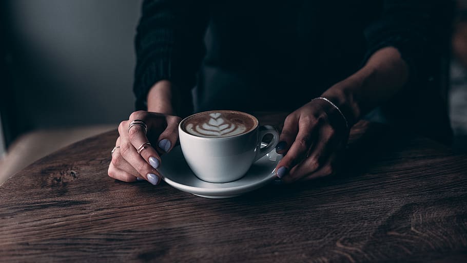 person facing cup of coffee, hand, drink, saucer, mug, latte HD wallpaper