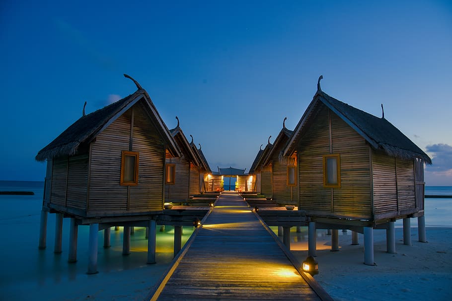 brown-bamboo-houses-near-seashore.jpg