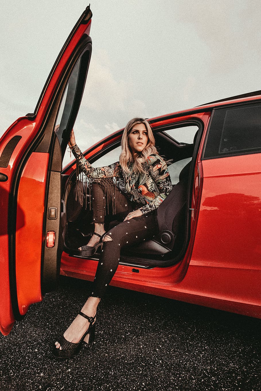 woman in black pants sitting on driver's seat, tire, machine, HD wallpaper