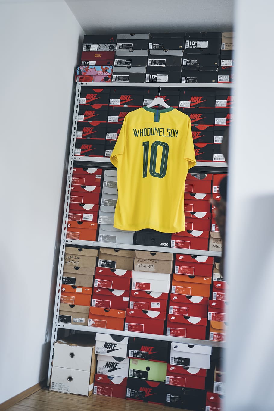 HD wallpaper: yellow and green Brazil soccer jersey hang beside shoe box, communication - Wallpaper Flare