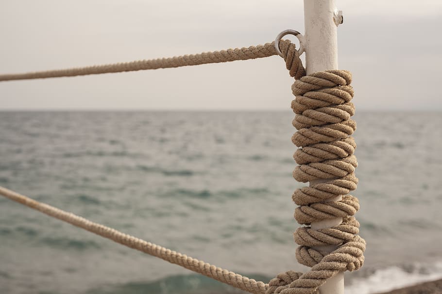 Close-up Photo of Rope, daylight, knot, ocean, outdoor, sea, water HD wallpaper
