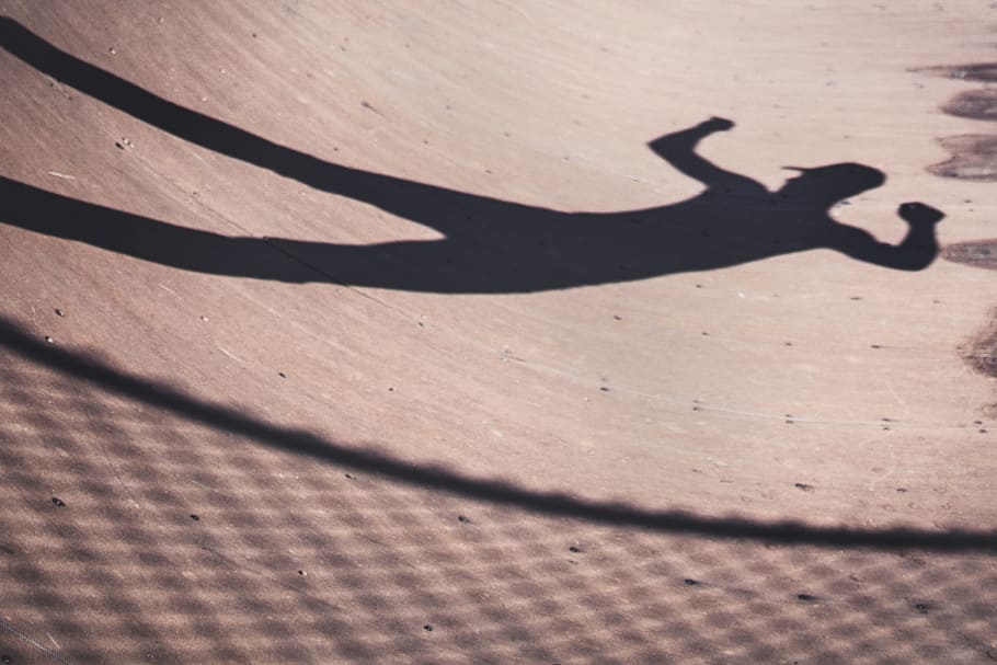 shadow of man near fence on sand, halfpipe, skateboard, skate park HD wallpaper