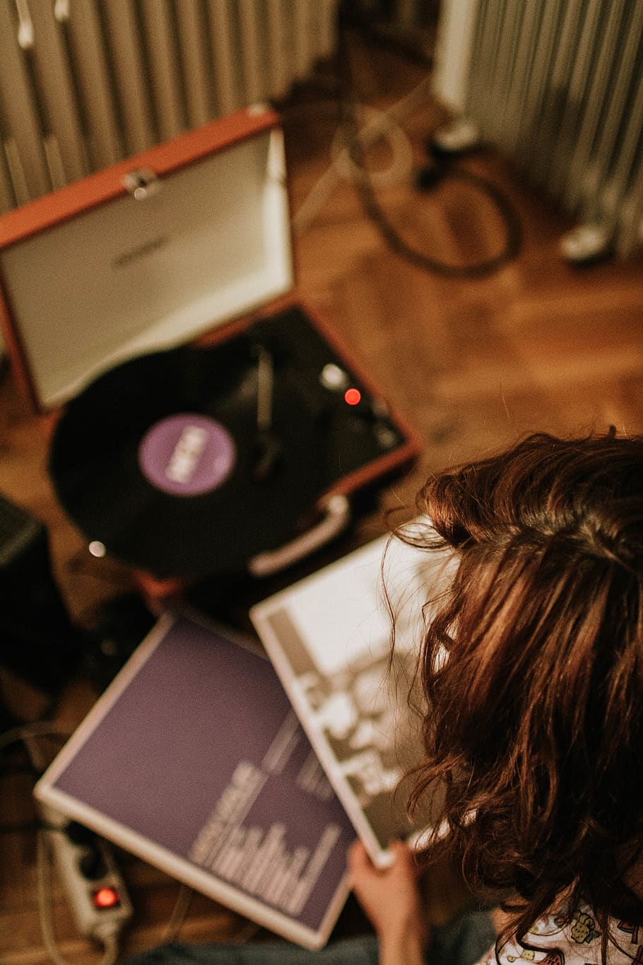Person Holding Vinyl Sleeve, audio, blur, device, equipment, girl HD wallpaper