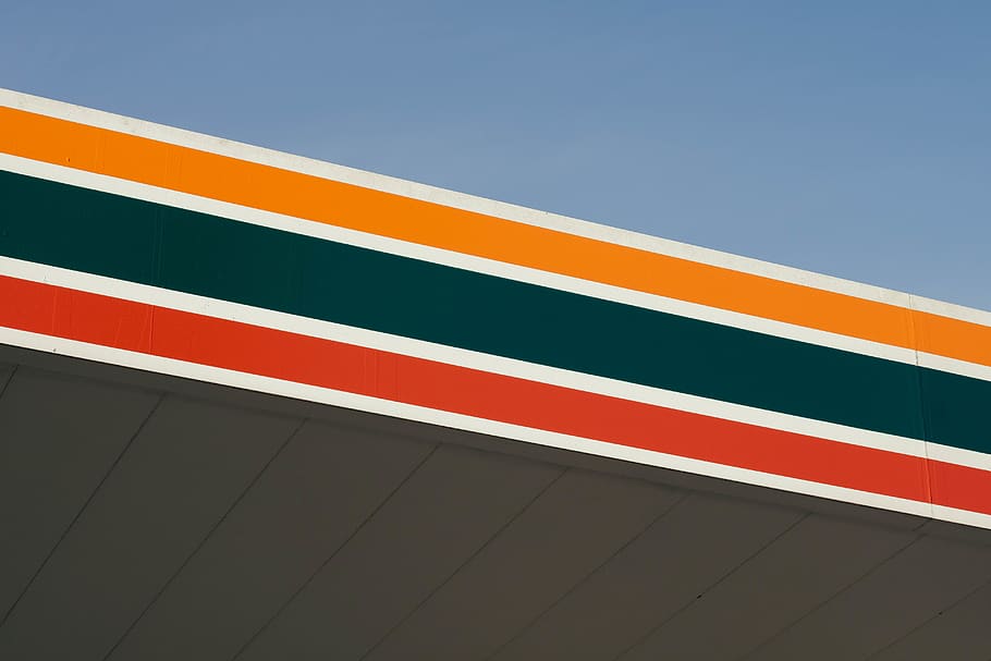 7 Eleven logo, blue, no people, low angle view, clear sky, architecture