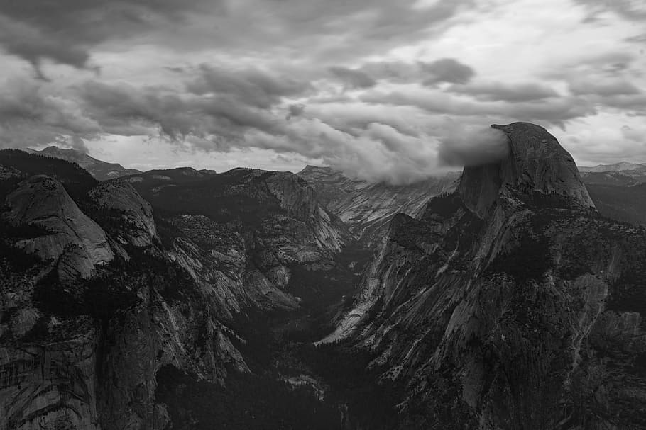 mountainous terrain under cloud formation, valley, sky, forest HD wallpaper