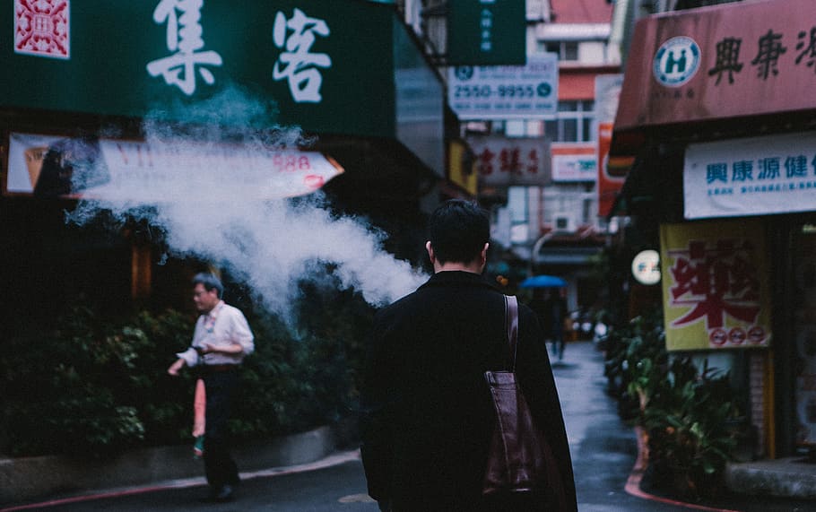 man walking on street photo, male, smoke, vape, asia, pedestrian