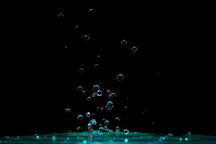 Close-up of Water Splashing Against Black Background, ripple HD wallpaper
