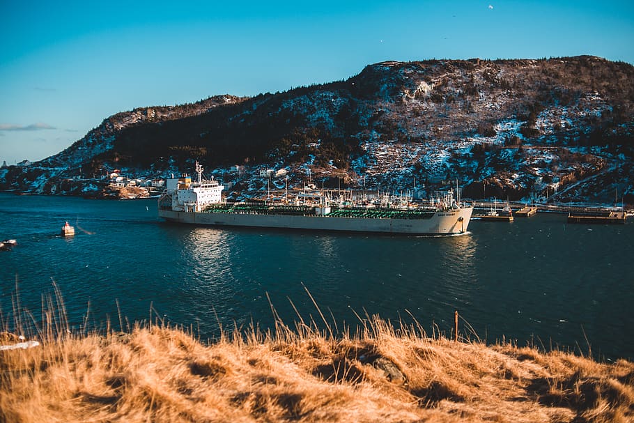 gray cargo ship docked beside mountain, vehicle, transportation HD wallpaper
