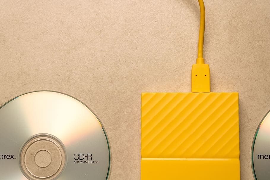 computer, disc, digital, storage, hard drive, yellow, no people HD wallpaper