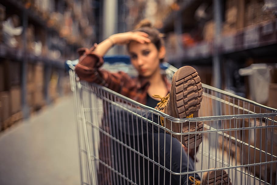 selective focus photography of woman sitting inside push cart, HD wallpaper