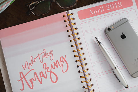 Pink calendar, notebook, diary, desk, text, indoors, paper, pen HD wallpaper